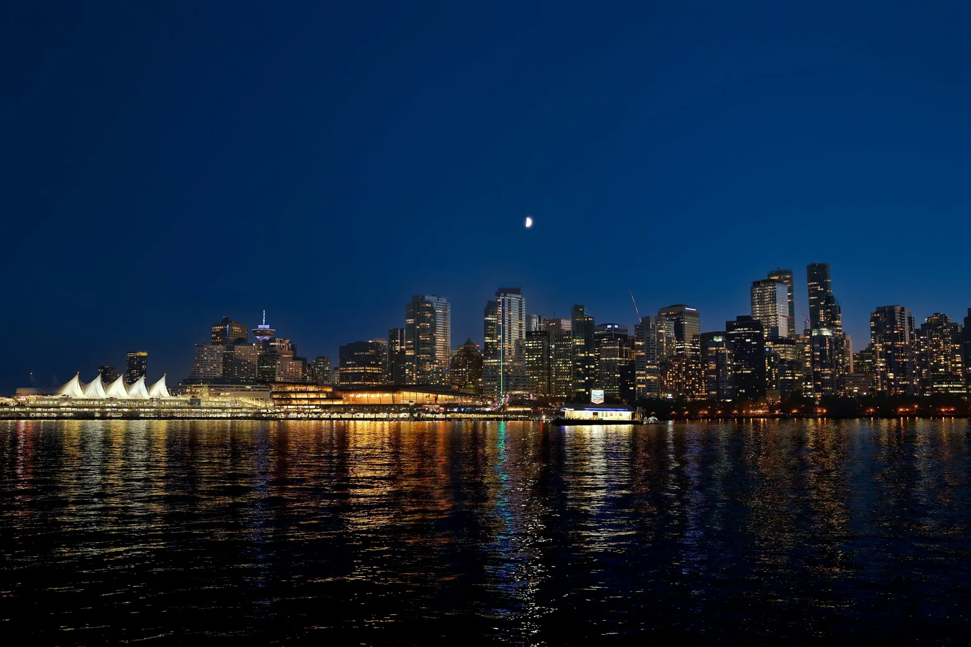 Vancouver skyline at night, reflected in the harbour